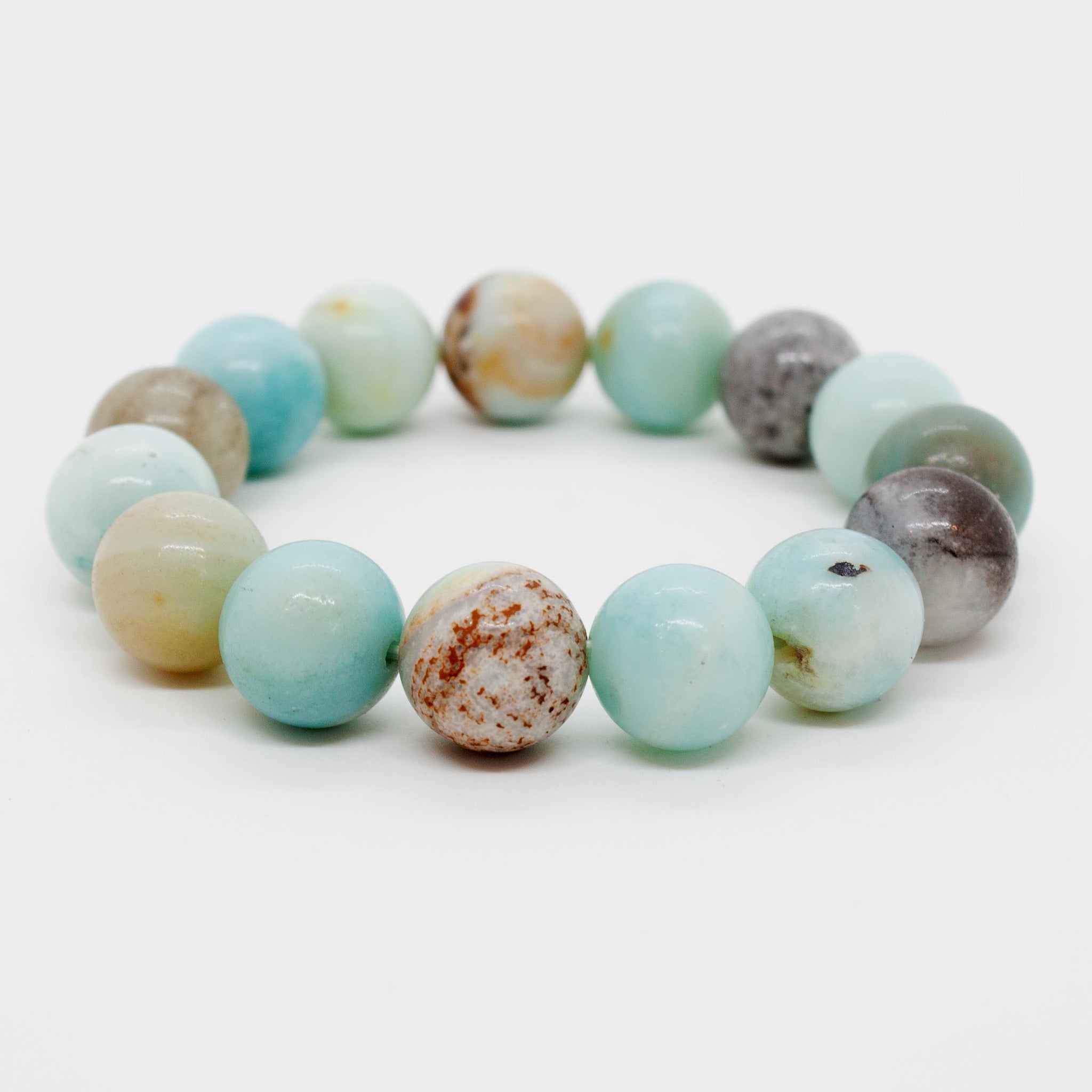 Treat your wrist to the subdued, earthy tones of black & gold amazonite. 7 inch beaded amazonite stretchy bracelet, double strung with silk elastic cord handmade in Toronto kp jewelry co.