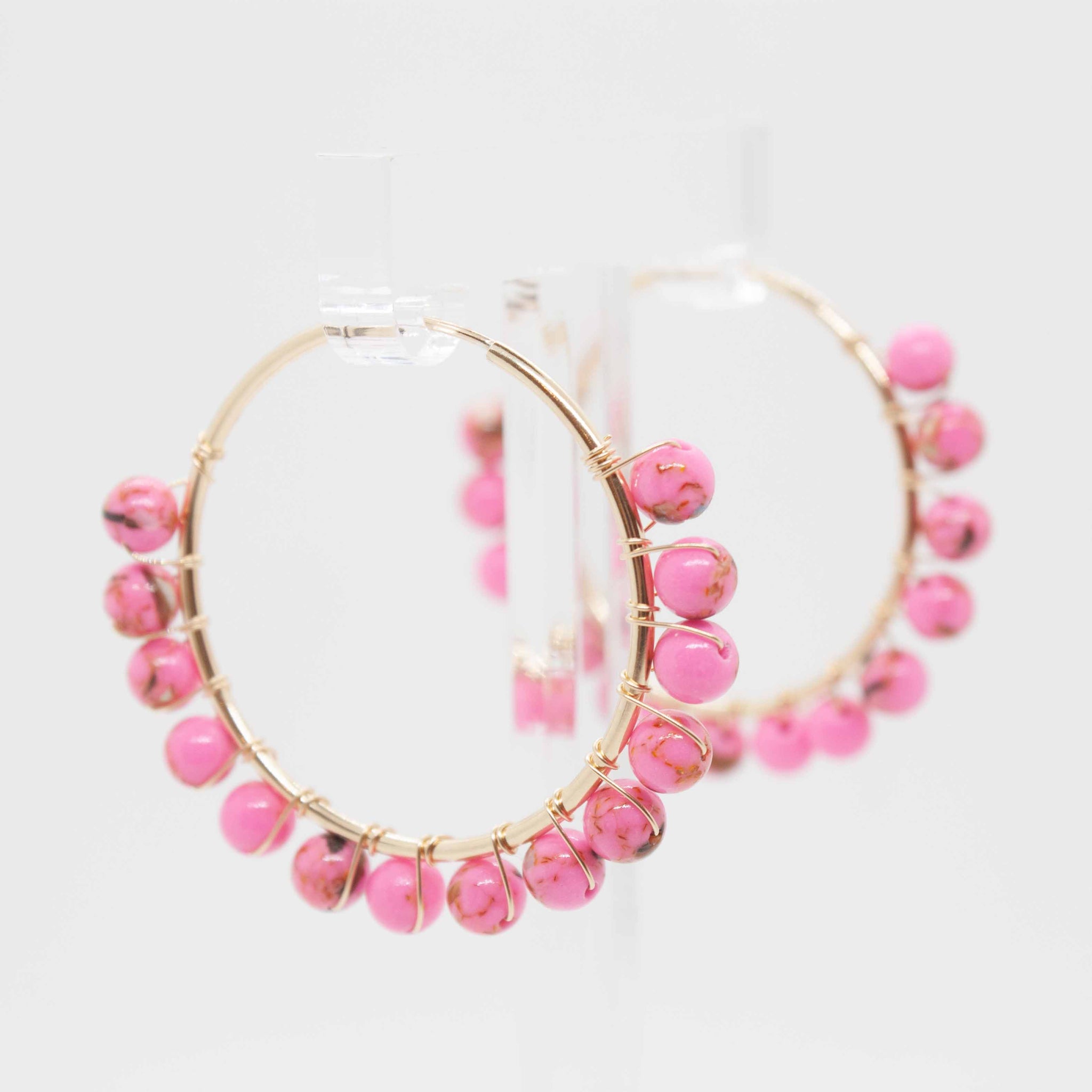 Cute and bubbly hoops to adorn your sweet lobes this summer!  30mm gold filled hoop earrings and pink beads wrapped with gold wire. Handmade in Toronto by kp jewelry co.