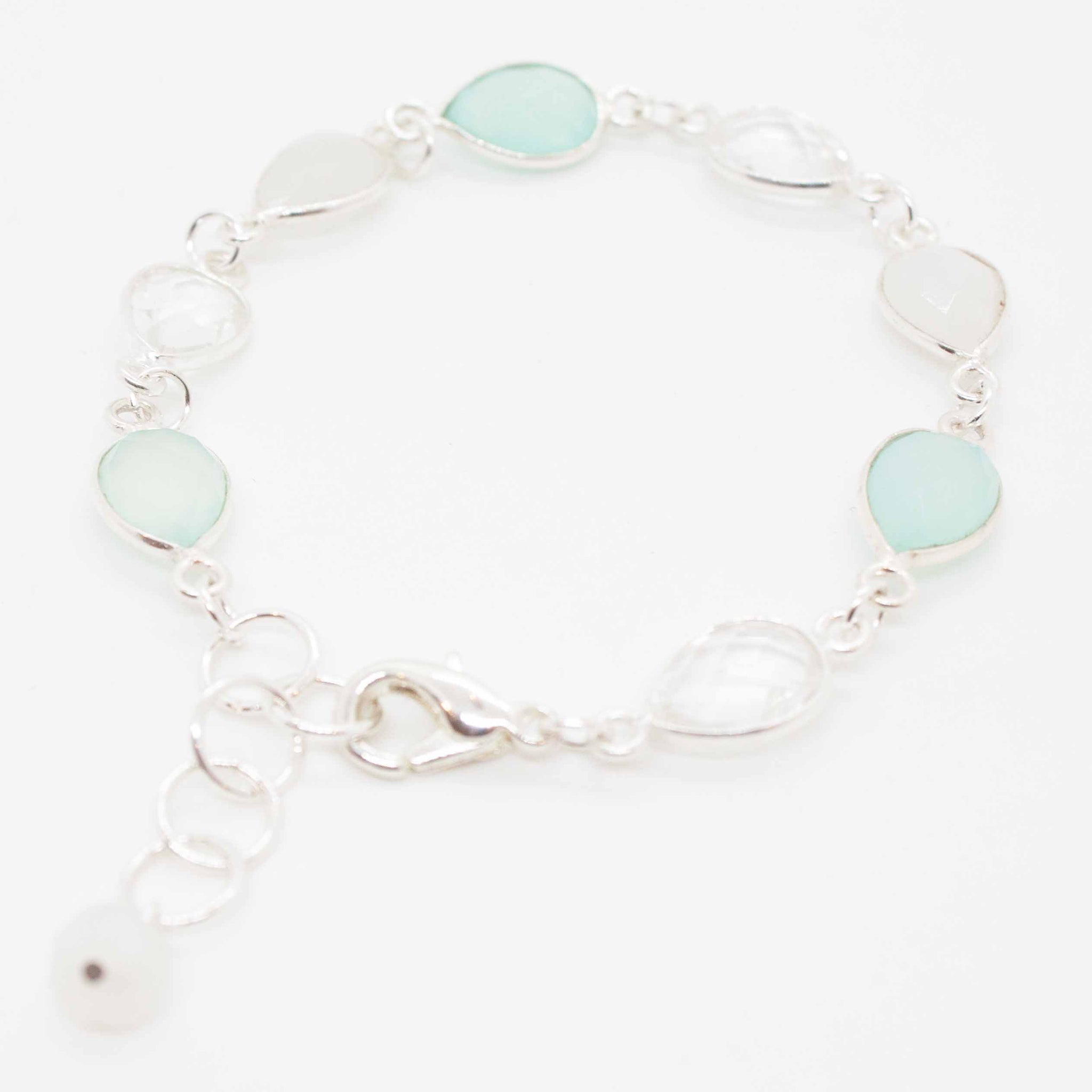Summon the ocean with this serene and sparkly bracelet made of chalcedony, quartz and moonstone. 7 inch (adjustable) sterling silver, chalcedony (light blue), quartz (clear) and moonstone (white) bracelet. Handmade in Toronto by kp jewelry co.