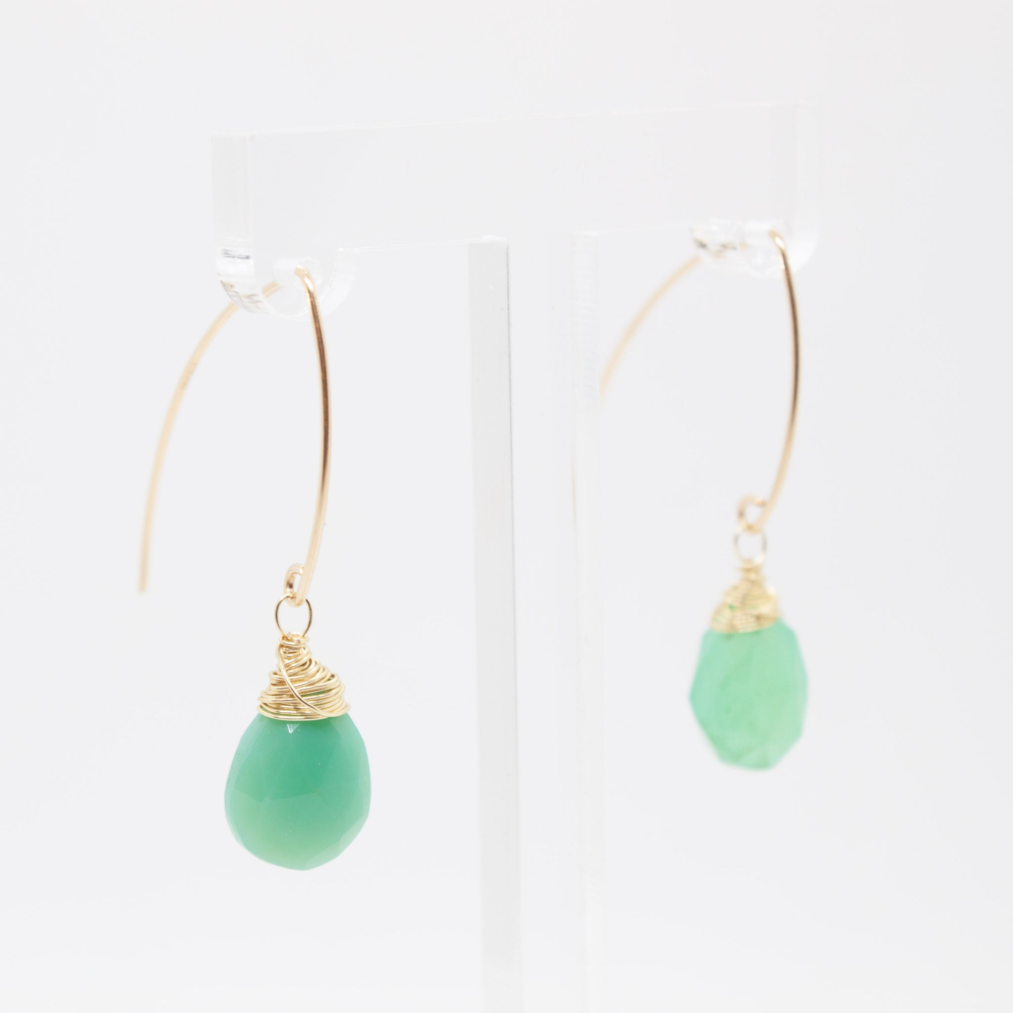 Bring joy, hope and happiness to your pretty lobes this summer with these delicate chrysoprase drops wrapped in gold. 1 inch earrings made with faceted, pear-shaped chrysoprase briolettes, wrapped in 14 karat gold wire on gold-filled earring hooks. Hypo-allergenic and sensitive ear friendly. Handmade in Toronto by kp jewelry co.