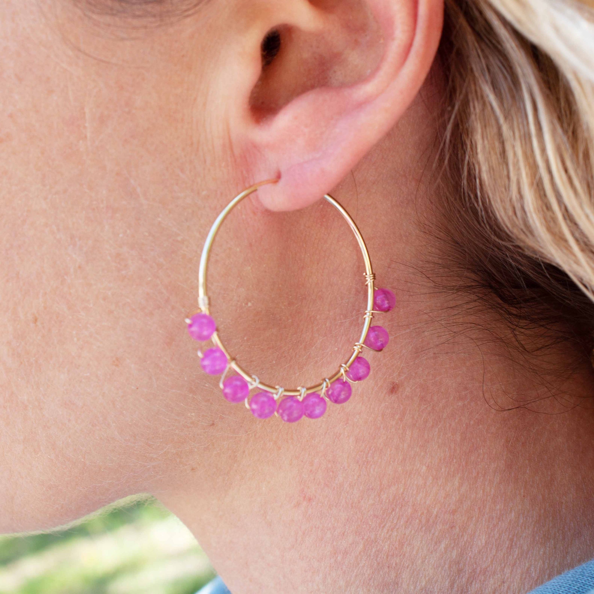 Bodacious ear candy to crank up your Zoom calls this summer!  40mm gold filled hoop earrings and fuchsia beads wrapped with gold wire handmade in Toronto kp jewelry co.