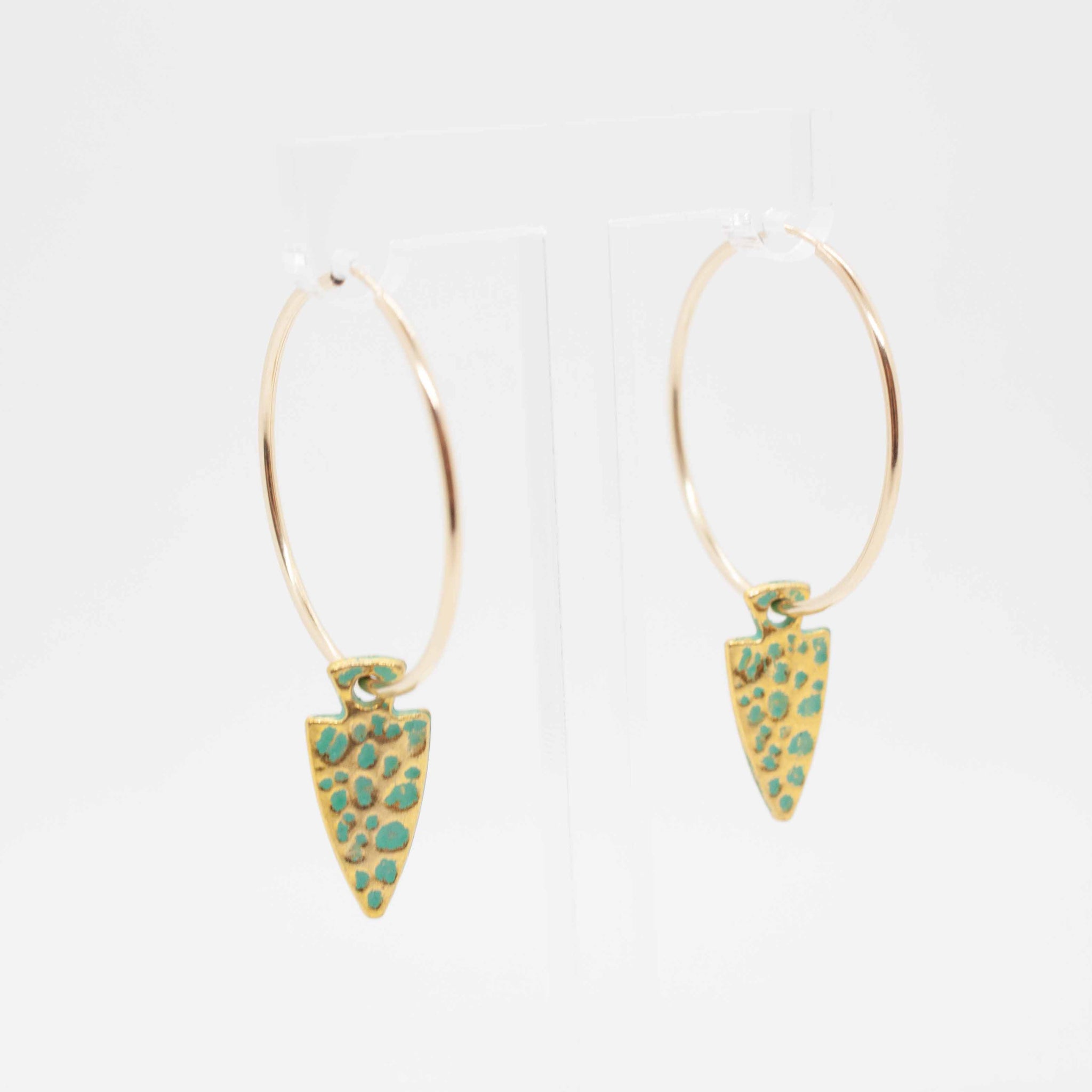 Get ready for battle in these turquoise and gold beauties! 40mm gold filled hoop earrings with vintage arrow head charms. Made in Toronto kp jewelry co.