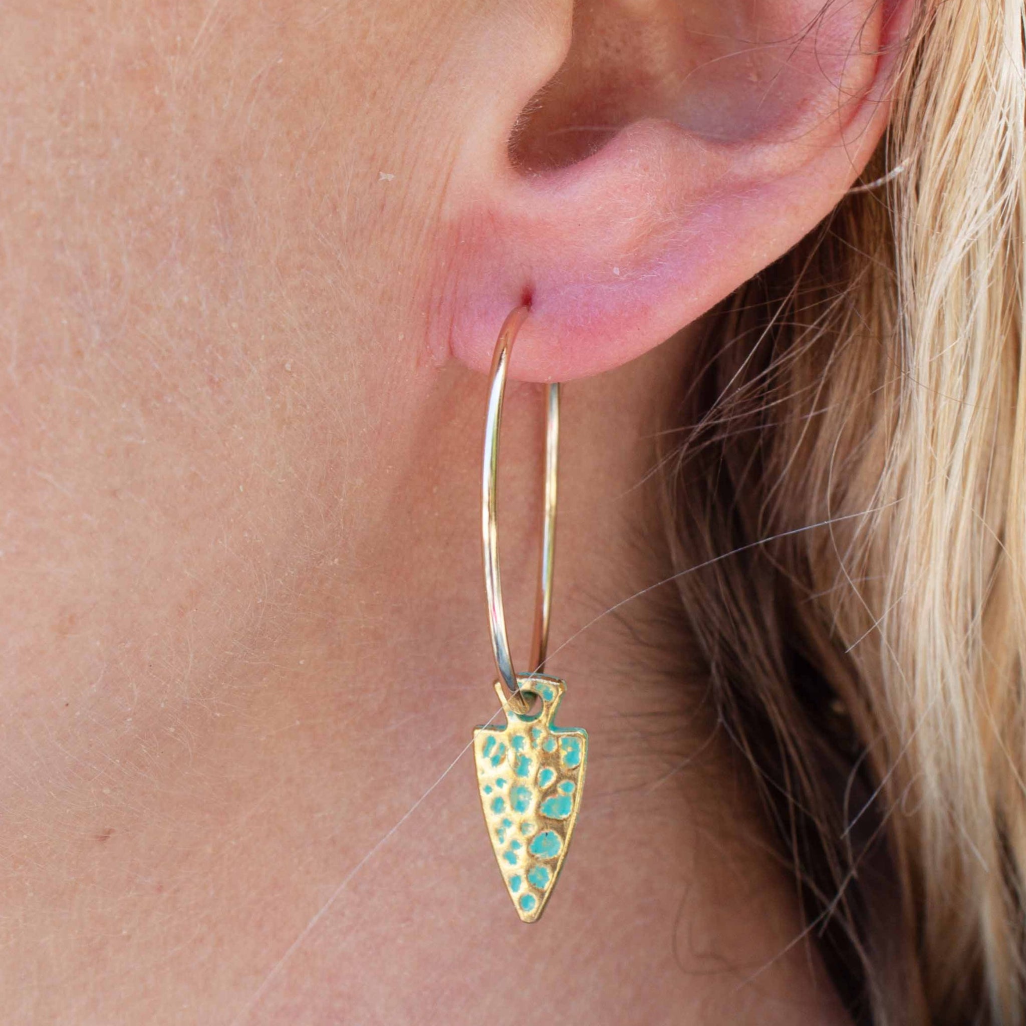 Get ready for battle in these turquoise and gold beauties!  40mm gold filled hoop earrings with vintage arrow head charms. Made in Toronto kp jewelry co.