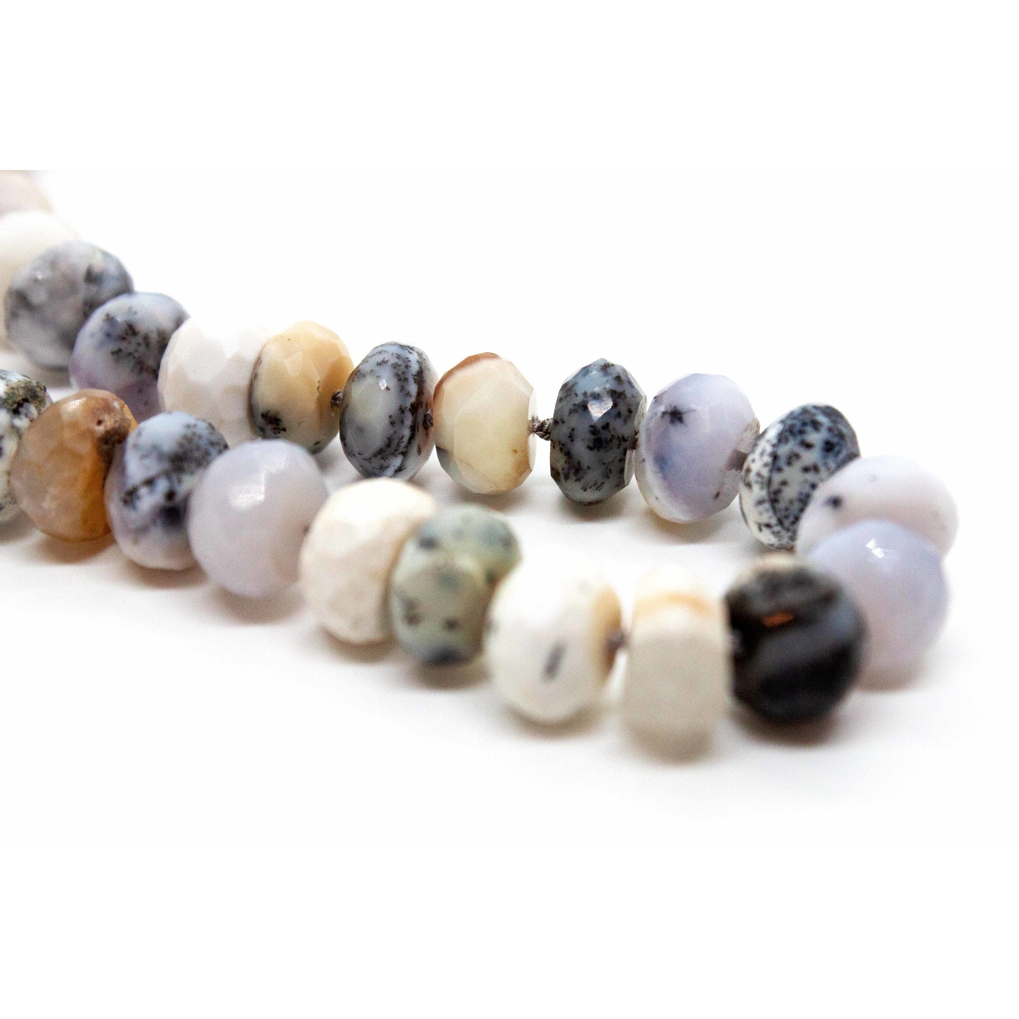 30 inch hand knotted, one-of-a-kind dendrite opal necklace, strung with silk thread and sterling silver toggle clasp.