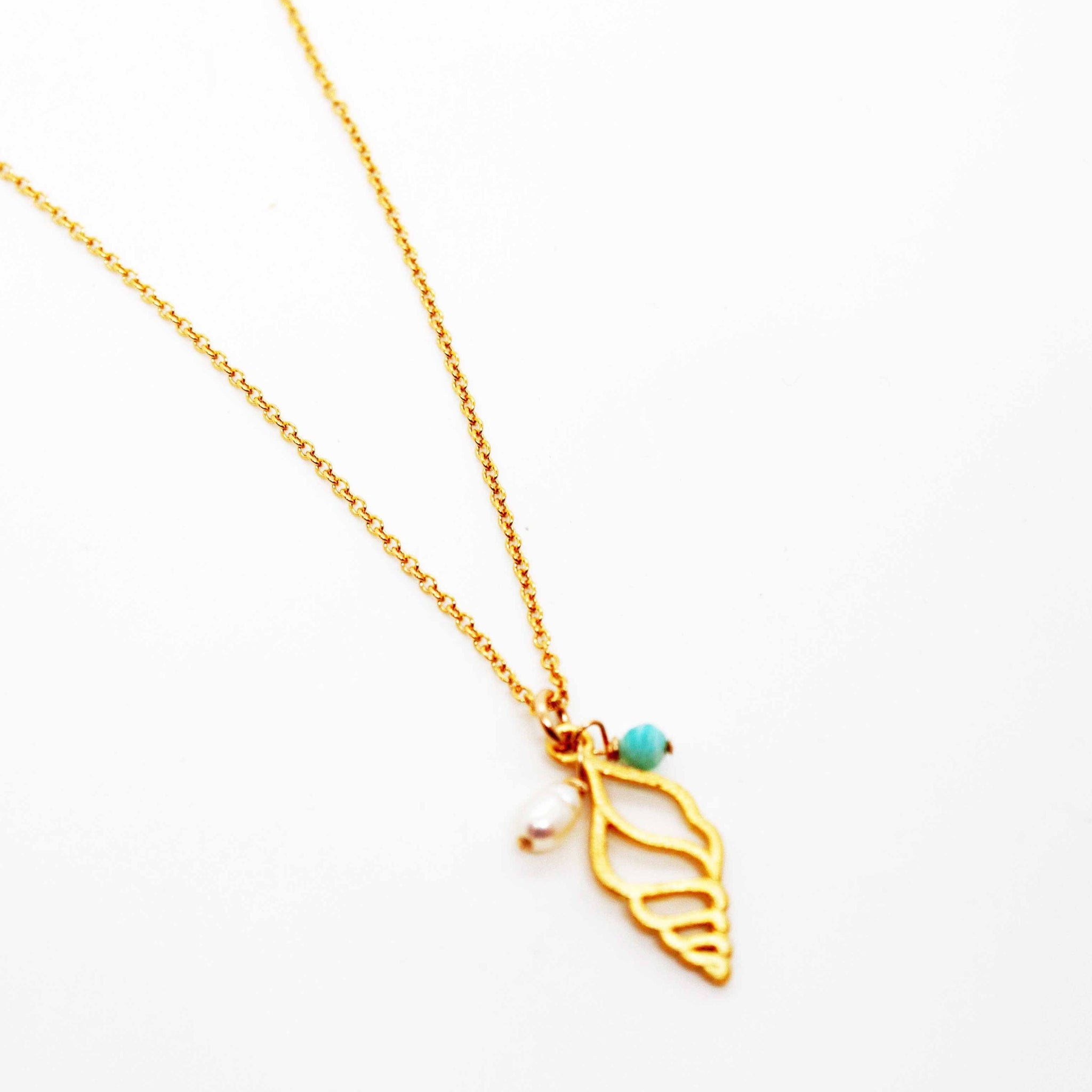Gold filled* chain with larimar & pearl beads on a gold vermeil* conch pendant handmade in Toronto by kp jewelry co.