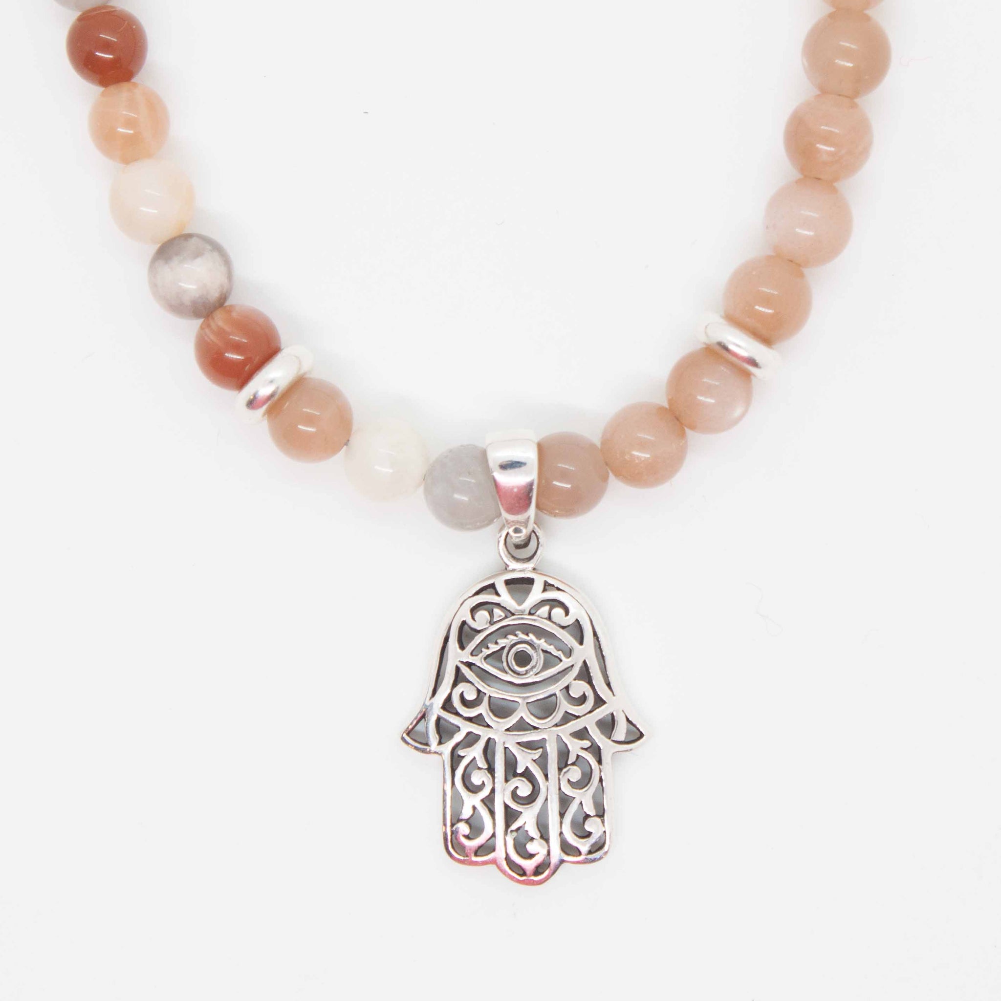 18 inch (adjustable to 20 inches) peach & mixed moonstone necklace with sterling silver hamsa charm.