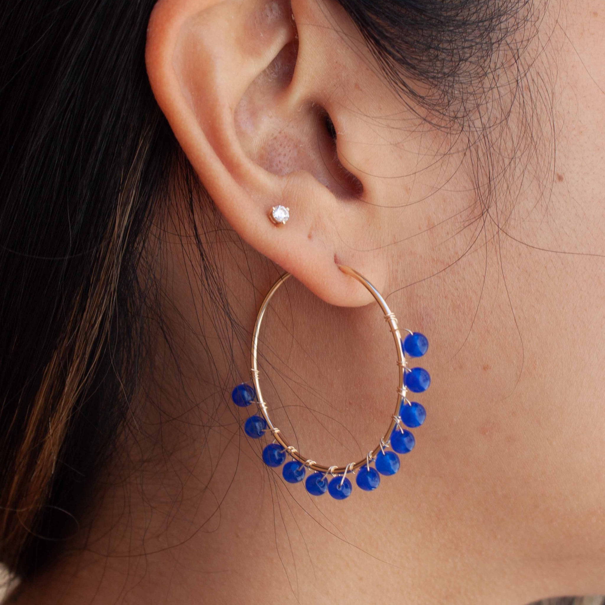 Bodacious ear candy to crank up your waterside cocktails this summer!  40mm gold filled hoop earrings and navy beads wrapped with gold wire. Handmade in Toronto by kp jewelry co.