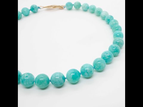 A kp jewelry co. staple! The amazonite collar is the best representation of all that we love about making jewelry: our favourite colour, our favourite technique (hand knotting) and a strong clasp with personality. Love it but want it in a longer length? Just let us know! 16 or 18 inch hand knotted amazonite necklace with gold vermeil leaf clasp. Handmade in Toronto by kp jewelry co.