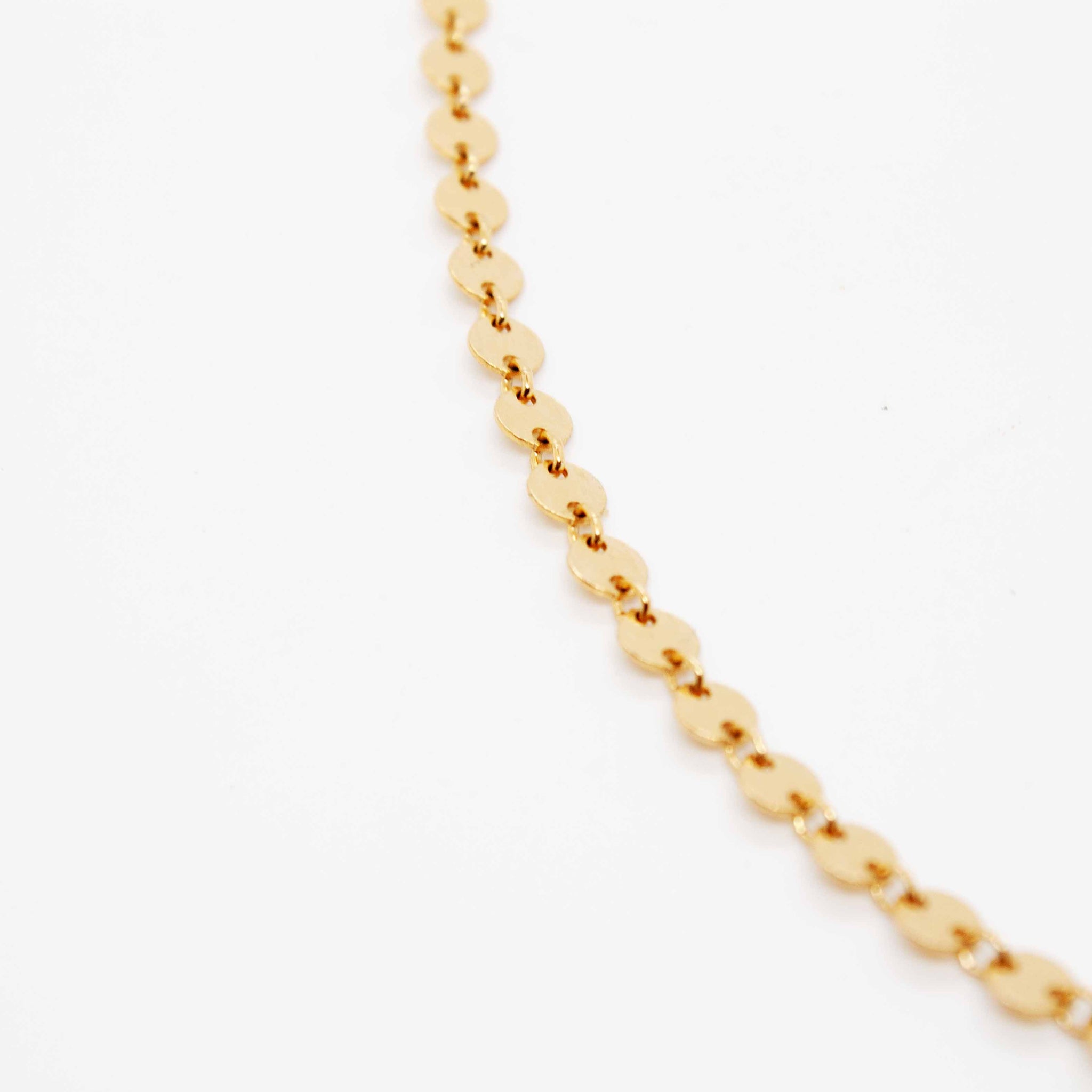 For LOVE of simplicity and classic elegance. 16 or 18 inch 14 karat gold filled* coin link chain. *Gold-filled jewelry is composed of a solid layer of gold, mechanically bonded to sterling silver. you are fine to shower in it, get it wet, wear it for life! kp jewelry co.