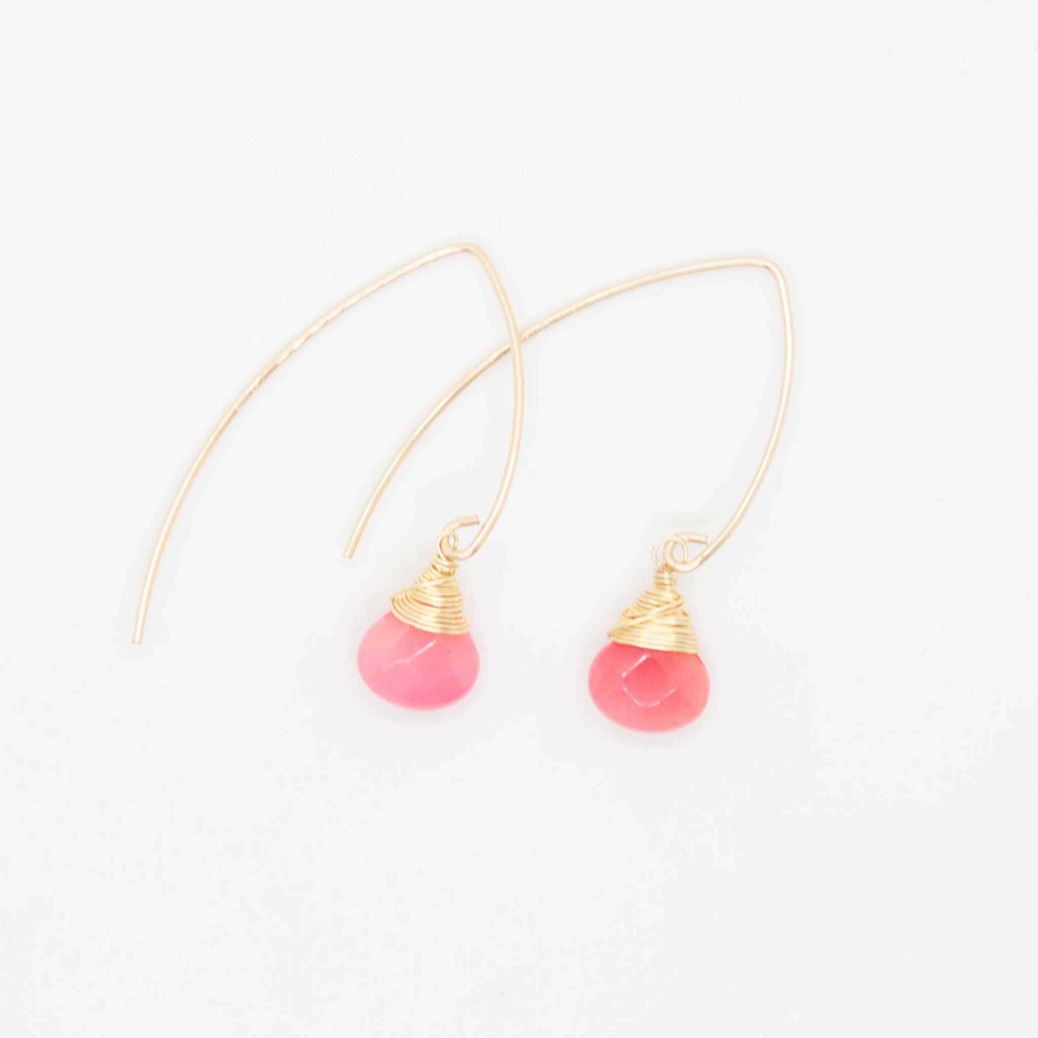 Decorate your pretty lobes this summer with these delicate jade drops wrapped in gold. 1 inch earrings made with faceted, pear-shaped pink jade briolettes, wrapped in 14 karat gold wire on gold-filled earring hooks. Hypo-allergenic and sensitive ear friendly. Handmade in Toronto by kp jewelry co.