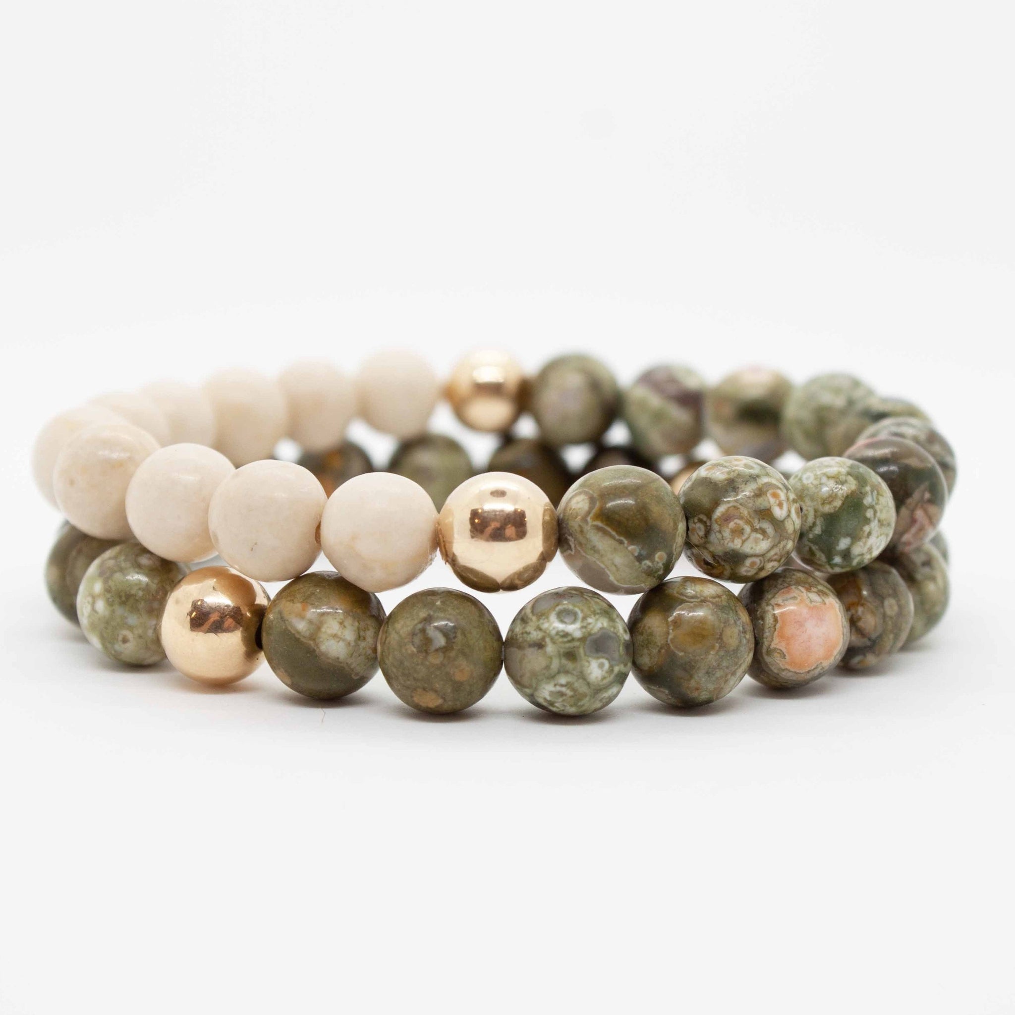 These beautiful rainforest jasper beads are the perfect way to commune with your love for nature. one 7" rainforest jasper, riverstone & gold bracelet, double strung with silk elastic. Handmade in Toronto by kp jewelry co.