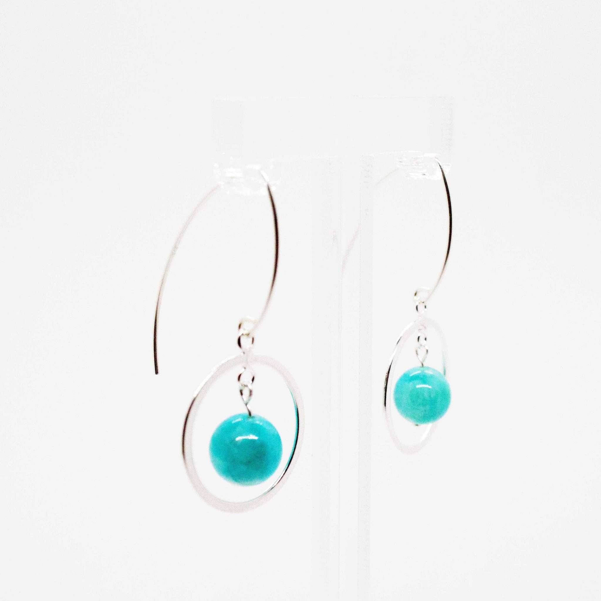 Light and summery, these amazonite and silver earrings will brighten every summer day! 1.5" earrings made with amazonite beads on sterling silver hoops and earring hooks hypo-allergenic and sensitive ear friendly. Handmade in Toronto by kp jewelry co.