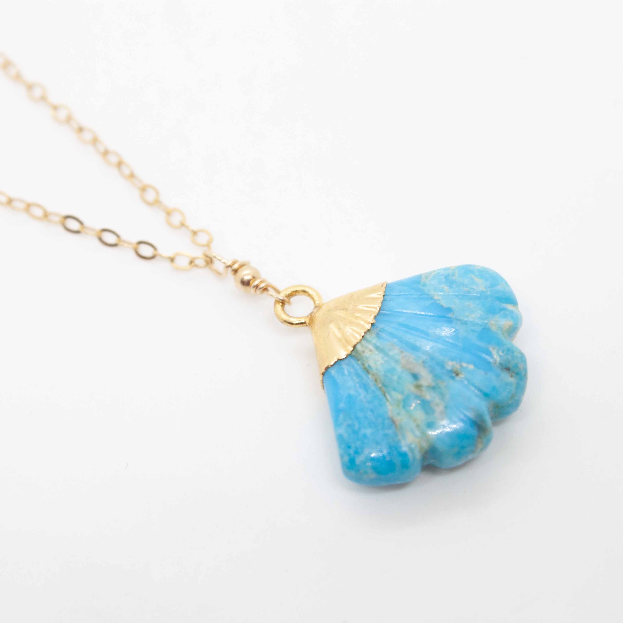 Add some pop to your summer whites with this uniquely shaped turquoise pendant! 18 inch gold filled necklace with 3/4 inch turquoise fan pendant. Handmade in Toronto by kp jewelry co.